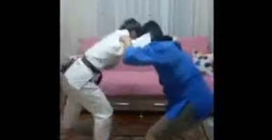 Milli sporcu Buse Uykun antrenmanlarını evde babası ile yapıyor